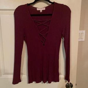 Criss cross plunging knit top